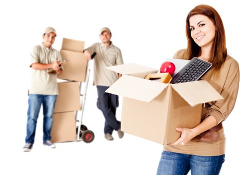 Packed moving boxes and labelled items prepared for flat removals in Northockendon